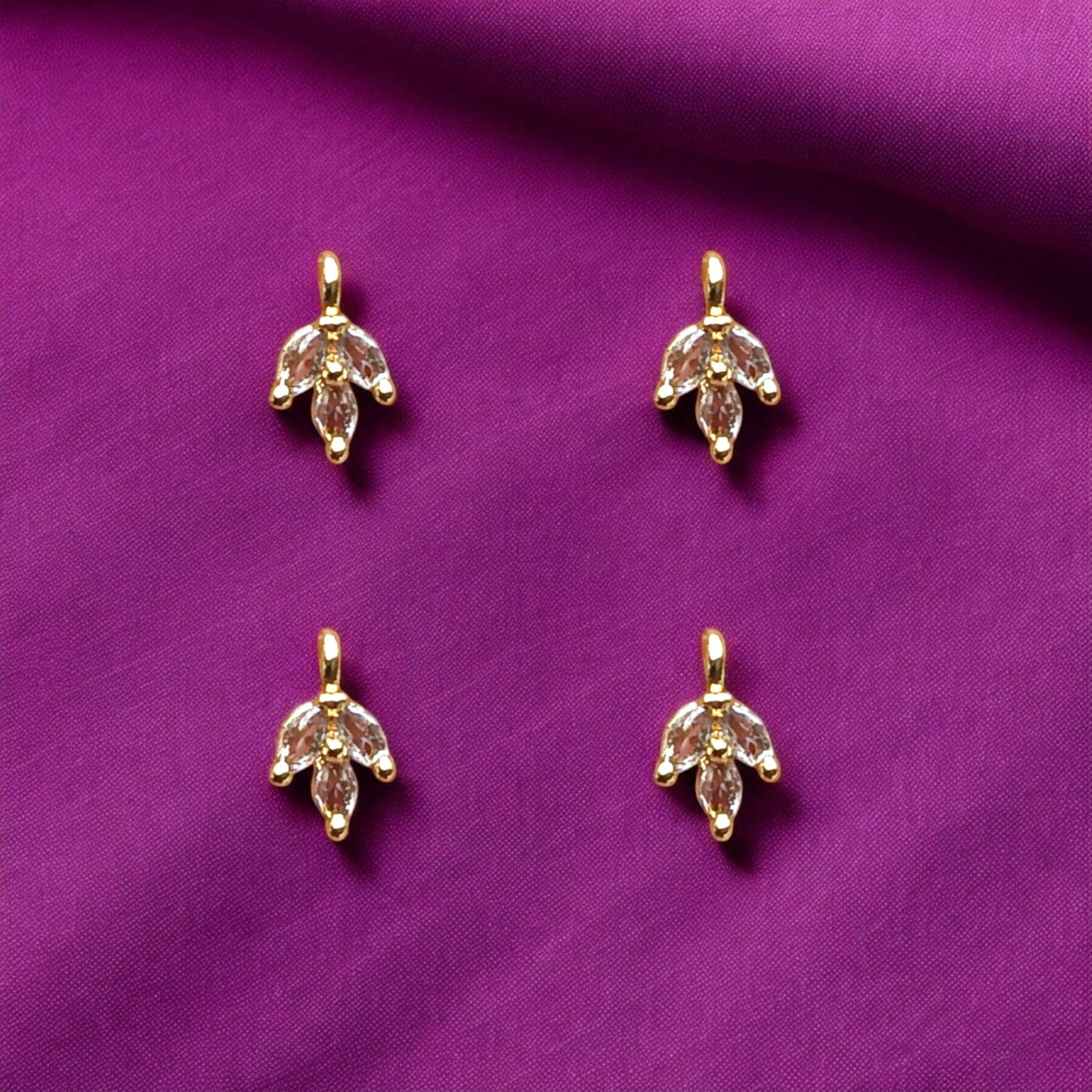 Nature-inspired leaf charm designed with brilliant AD stones, adding a luxurious sparkle to handcrafted jewelry pieces.