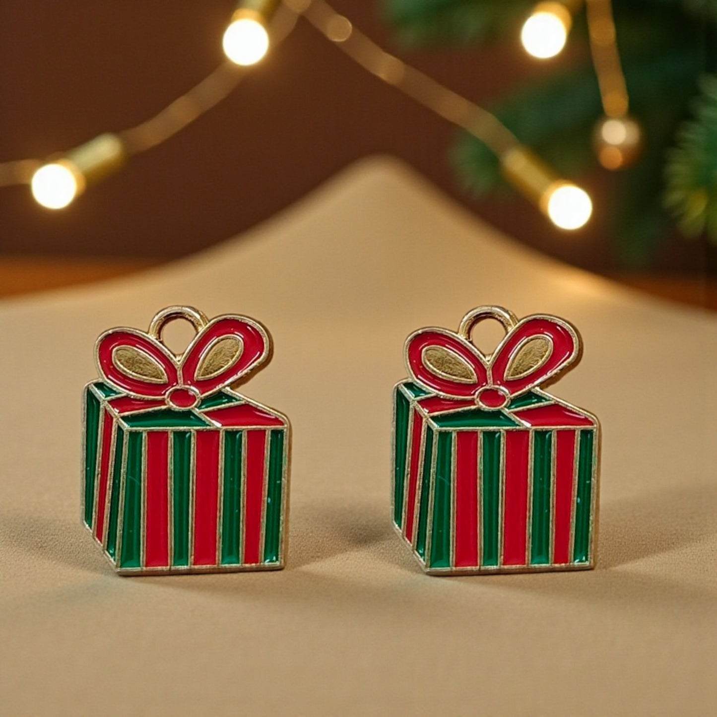 Gift-themed Christmas charms with festive colours, perfect for holiday jewellery and DIY crafting.
