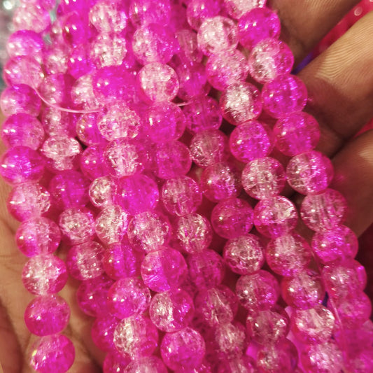 Vibrant crackle beads with a blend of dark pink, white, and iridescent hues, adding texture and color to handmade accessories.