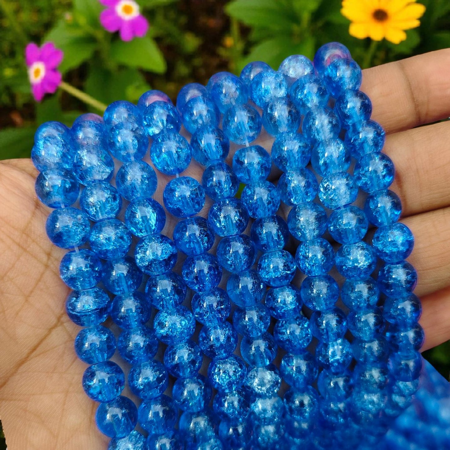 Royal blue crackle beads with a shiny cracked-glass effect for jewelry making and DIY crafts