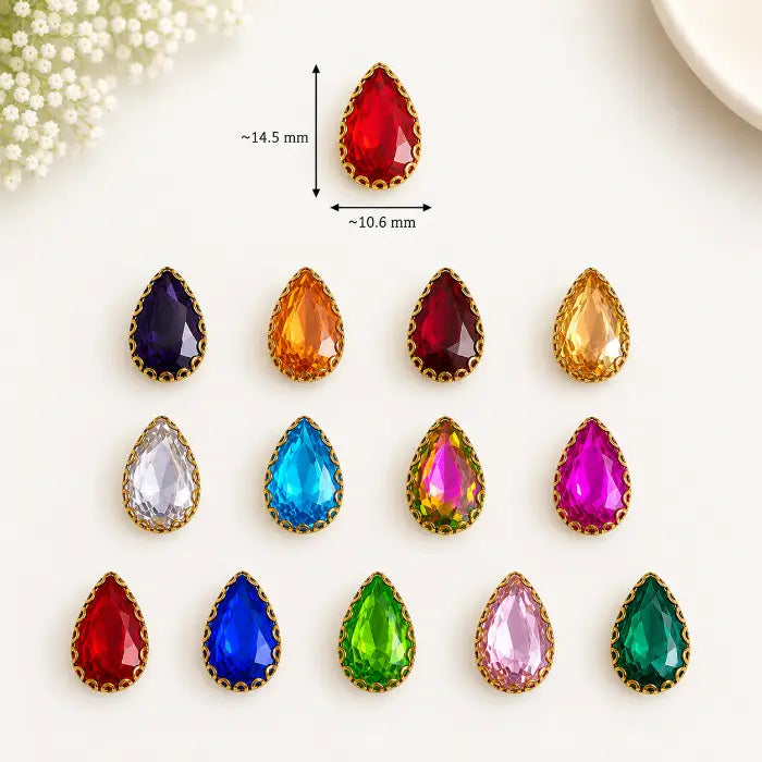 Teardrop Clip Stone with faceted surface and gold-tone border in assorted colours