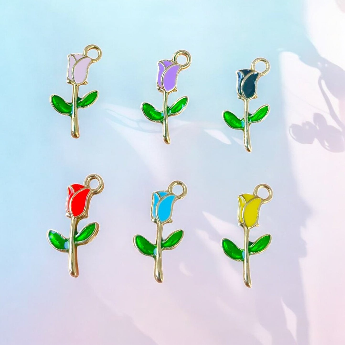 Delicate tulip flower-shaped charms, ideal for jewelry making and craft decoration.