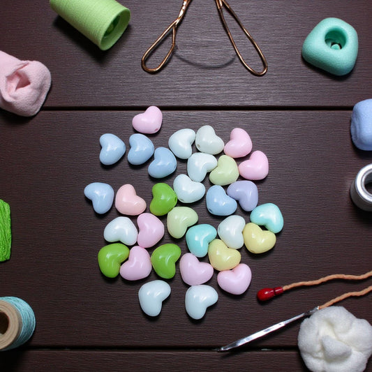 Acrylic heart beads in pastel colors for DIY craft and jewelry making.