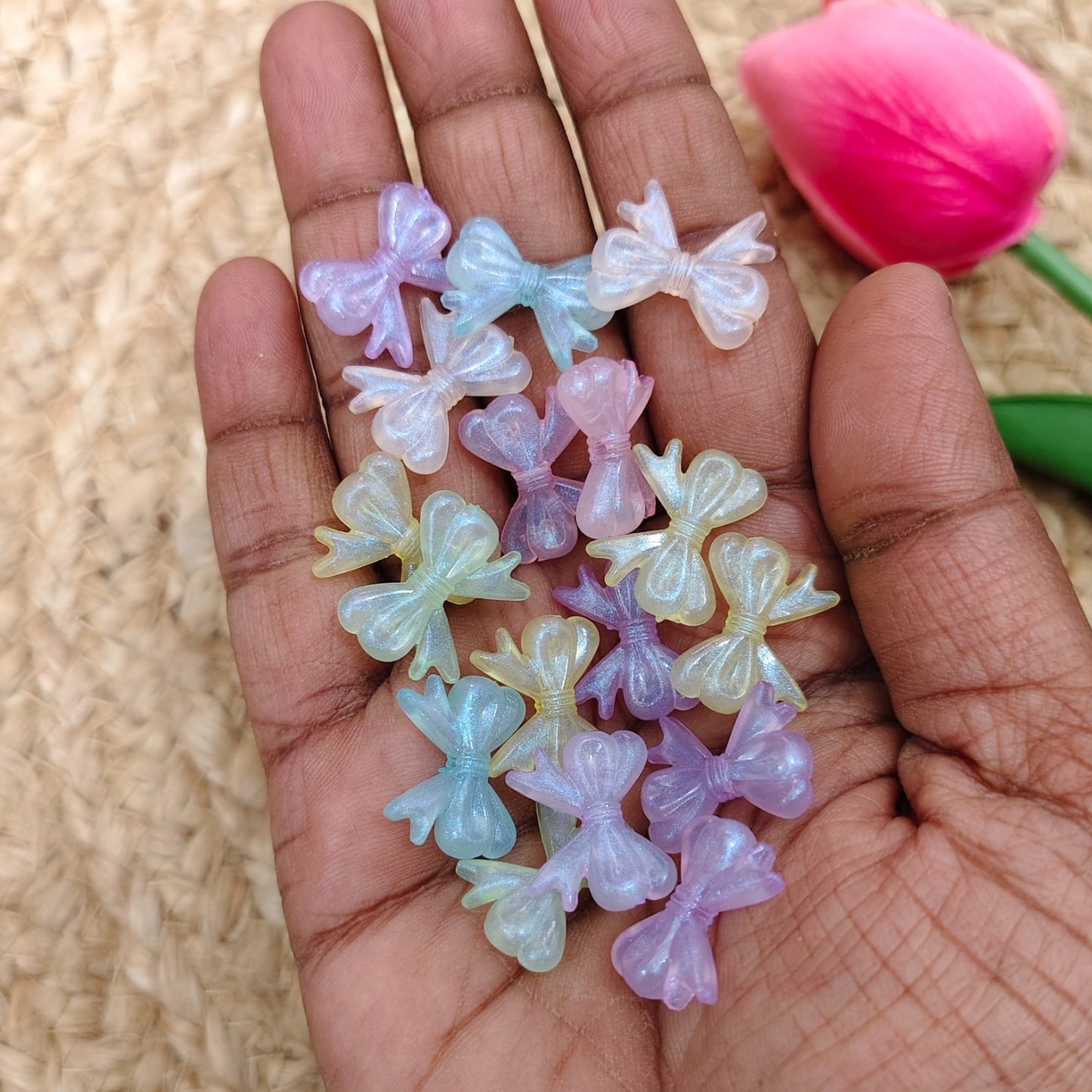 Radium glow bow beads in luminous finish for jewellery making and DIY craft projects