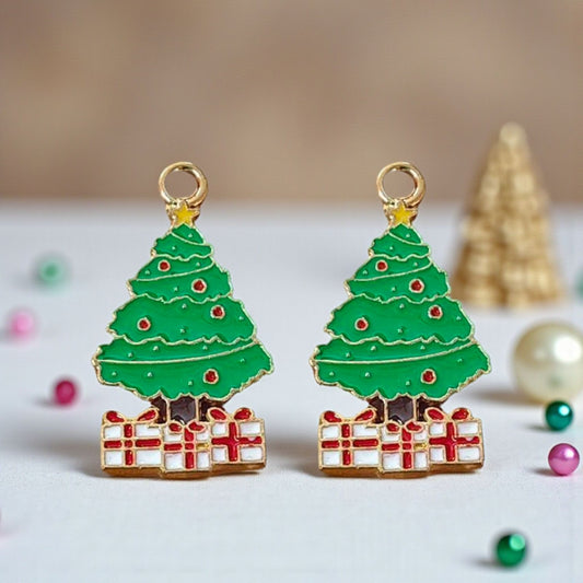 Christmas tree charms with festive green enamel and decorative detailing, perfect for holiday jewellery making.