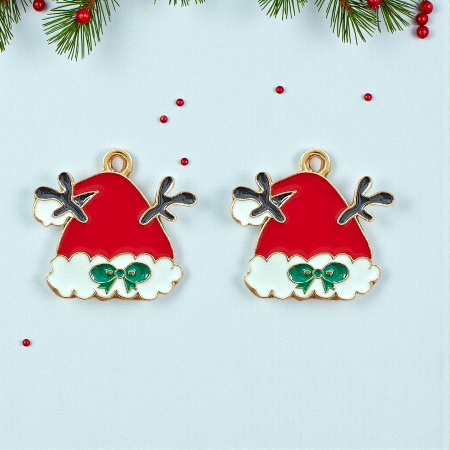 Santa Claus hat Christmas charms with red and white festive detailing, perfect for holiday jewellery making.
