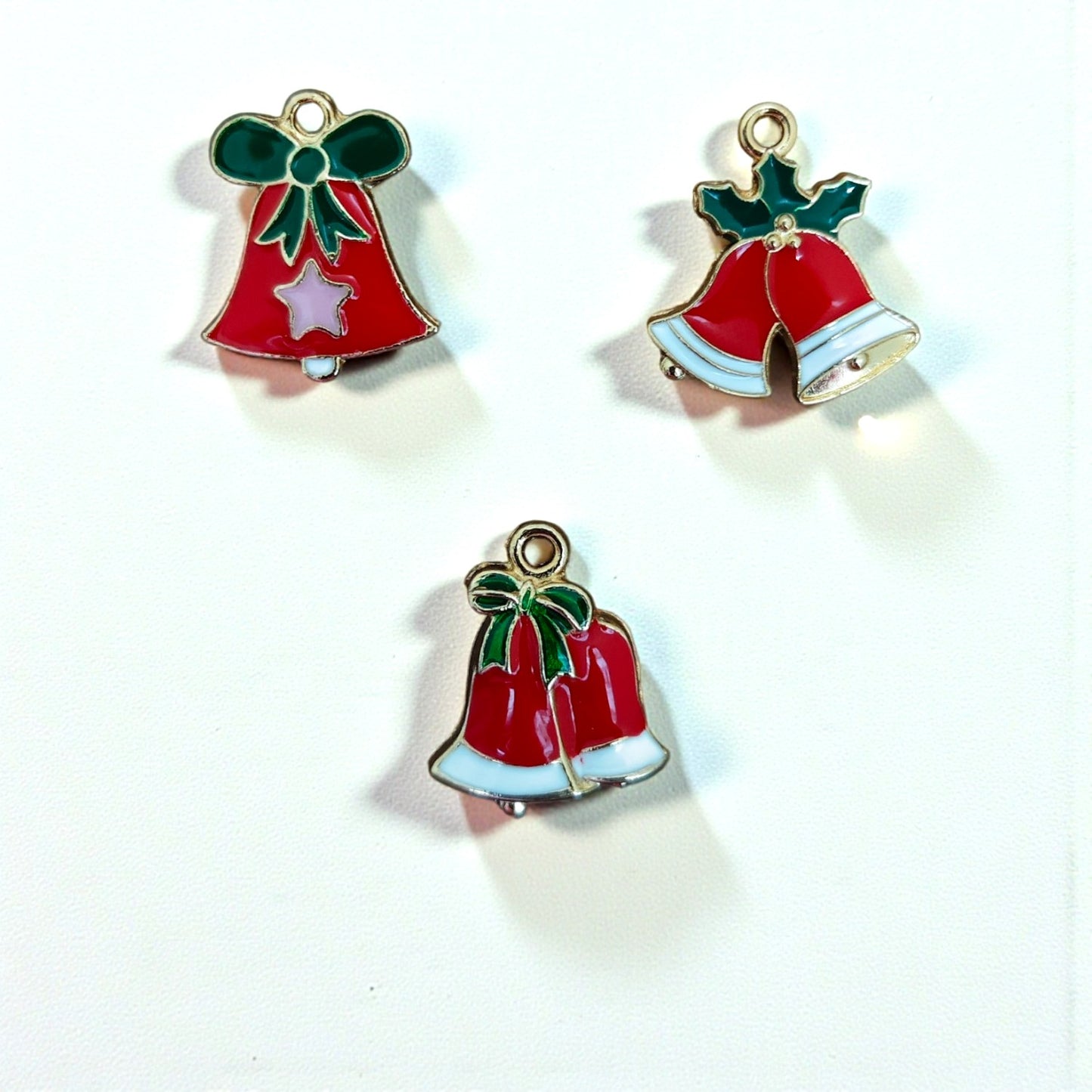 Christmas bell charms for jewellery making and DIY crafts with festive gold finish