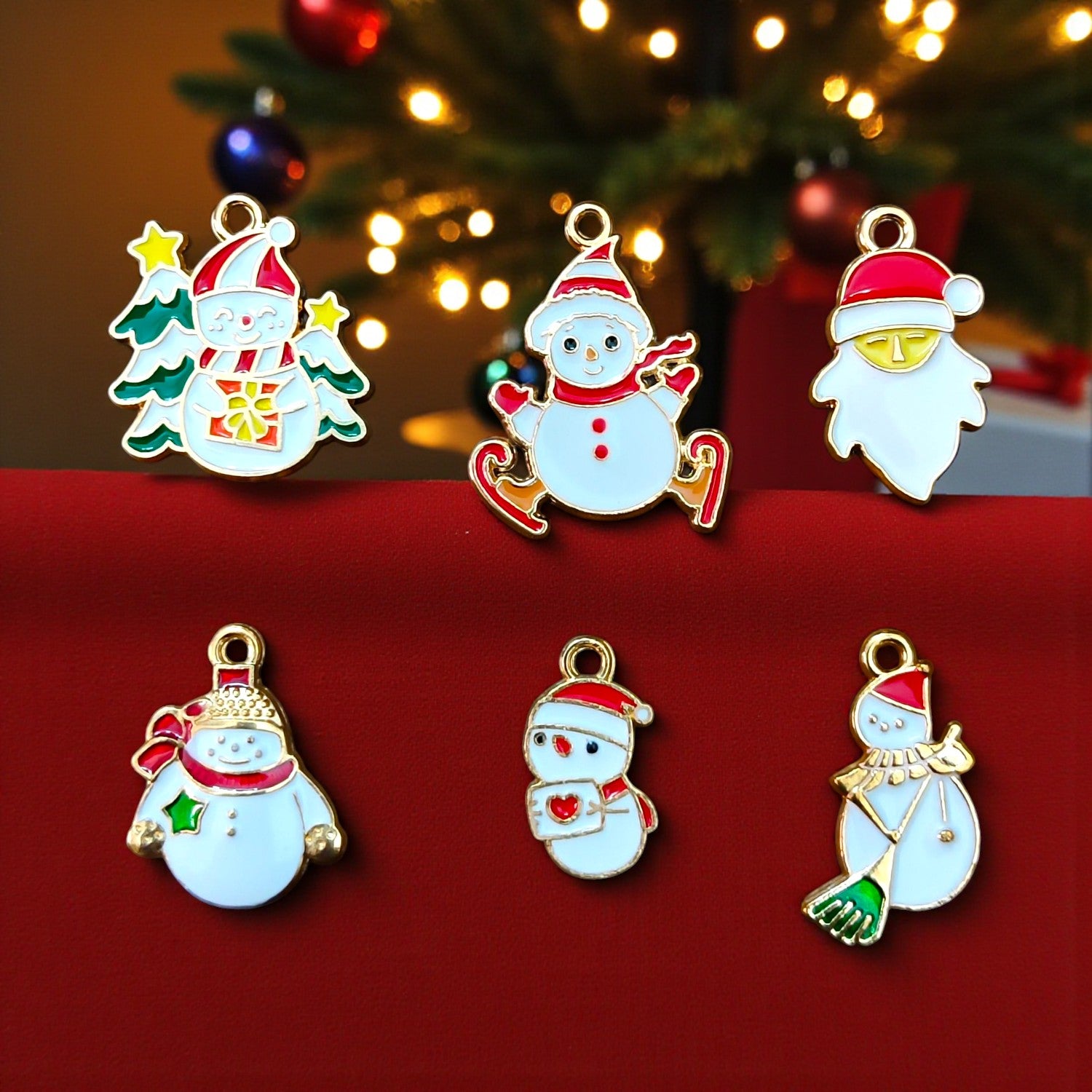 Cute Christmas Snowman Charms with colorful enamel details for festive jewelry and DIY crafts