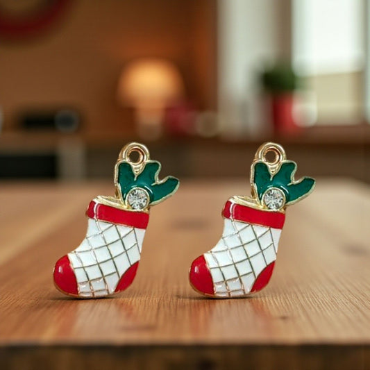 Christmas stocking charms with festive red and white detailing, ideal for holiday jewellery making and DIY crafts.