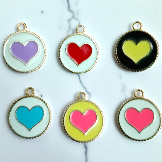 Circle heart charms featuring a heart design within a round frame, perfect for DIY jewelry and craft projects