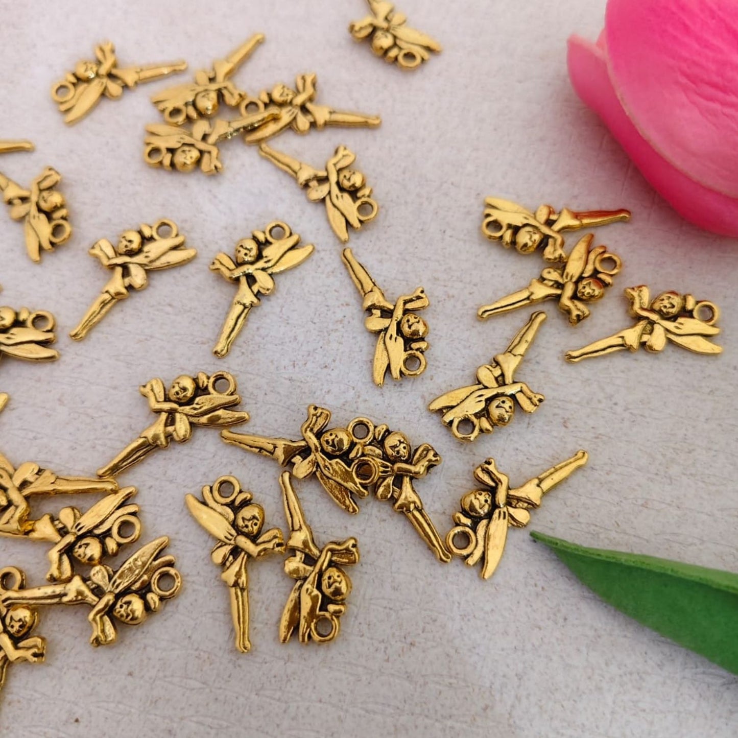 Gold flying angel metal charm with detailed wings for jewellery making and DIY crafts by Eva Fashion and Craft