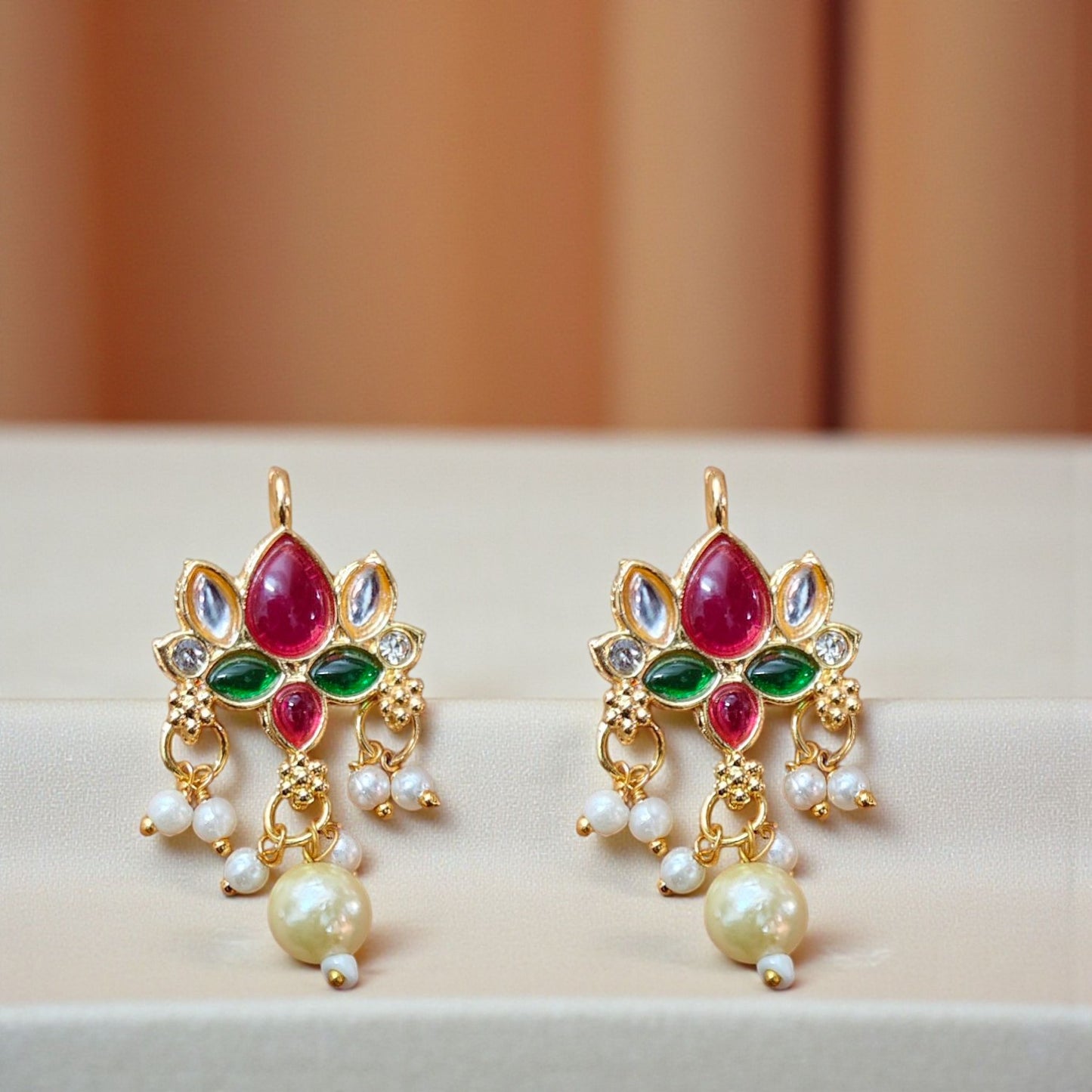 Kundan lotus pendant with pink and red stones and pearl drop, traditional ethnic jewelry making pendant.