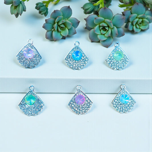 Luxury Leaf Shimmering Stone Charm with elegant leaf design and sparkling stones.