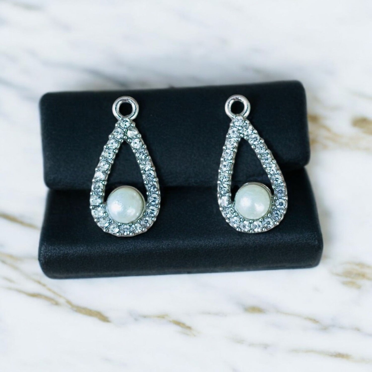 Elegant water drop-shaped stone charms with a luxurious, faceted finish, perfect for high-end jewelry making