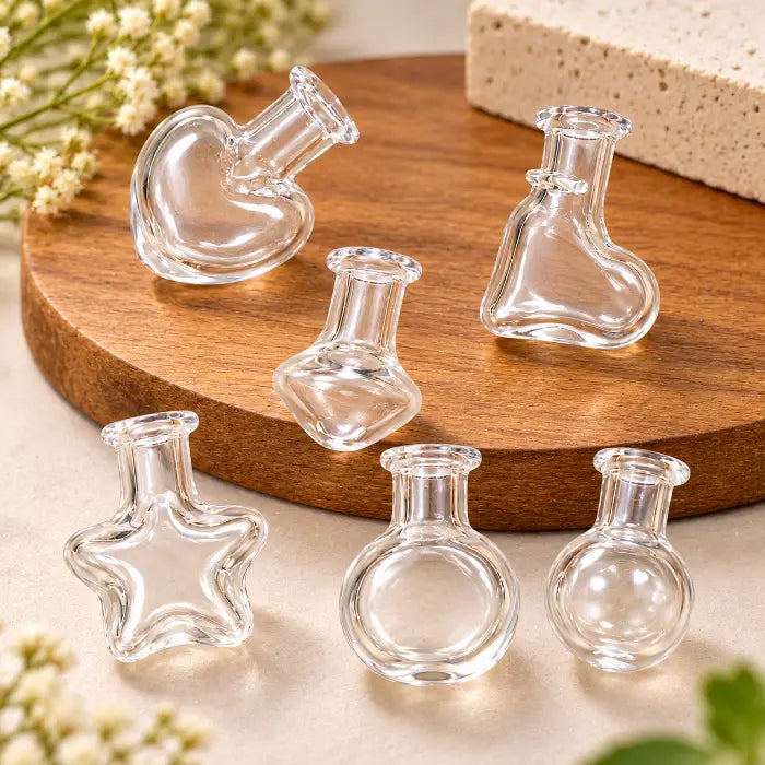 Assorted Transparent Miniature Glass Bottles in Random Decorative Shapes