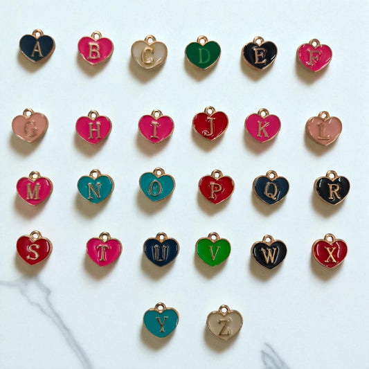 Multicolor Heart-shaped alphabet charms perfect for personalized jewelry, keychains, and craft projects.