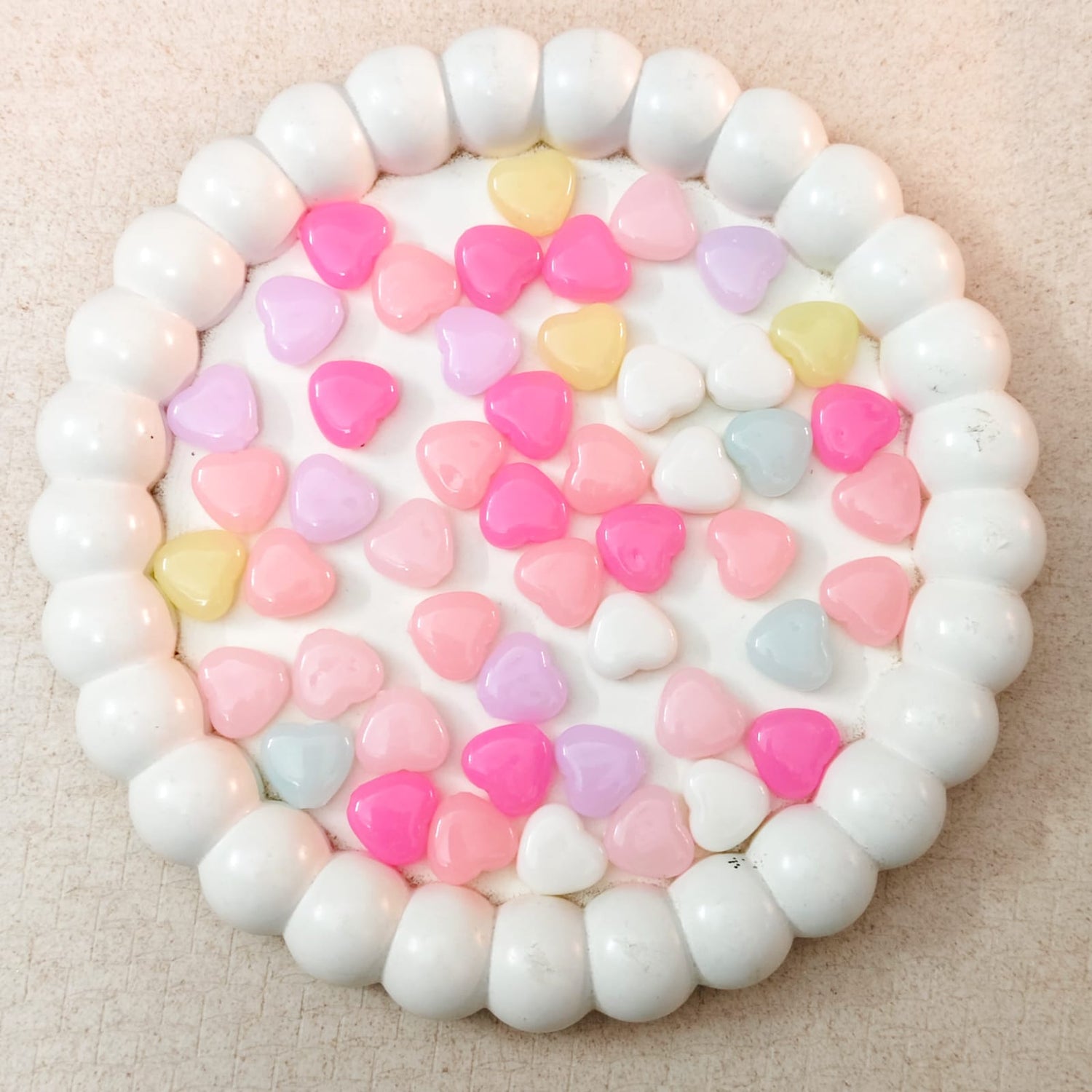 Pastel color acrylic heart beads for jewellery making in soft pink blue yellow and lavender shades