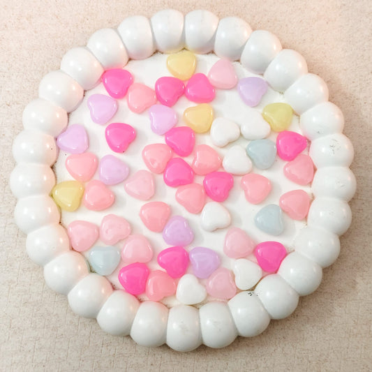 Pastel color acrylic heart beads for jewellery making in soft pink blue yellow and lavender shades