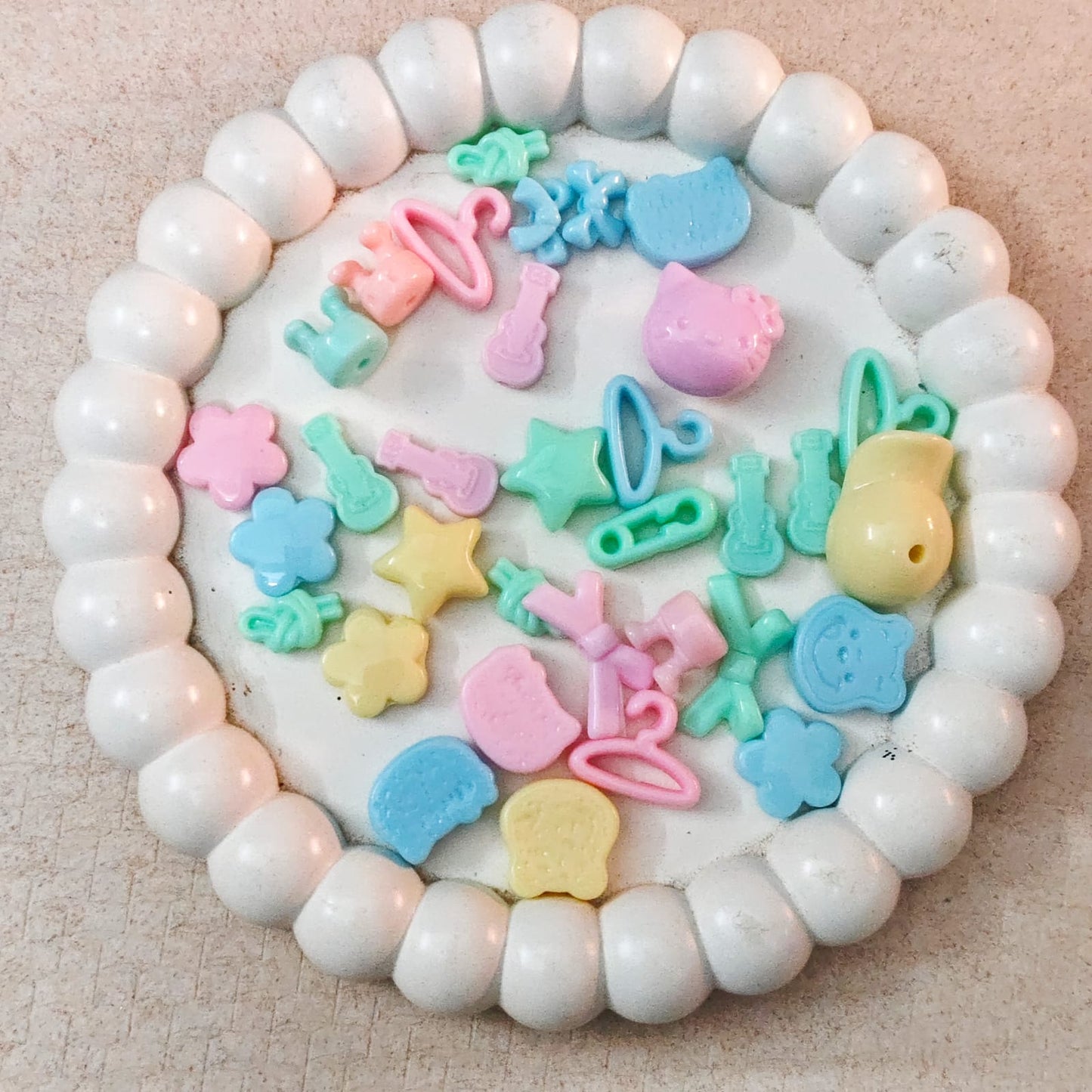 Pastel color assorted fancy acrylic beads in mixed shapes and soft shades for jewellery making and DIY crafts