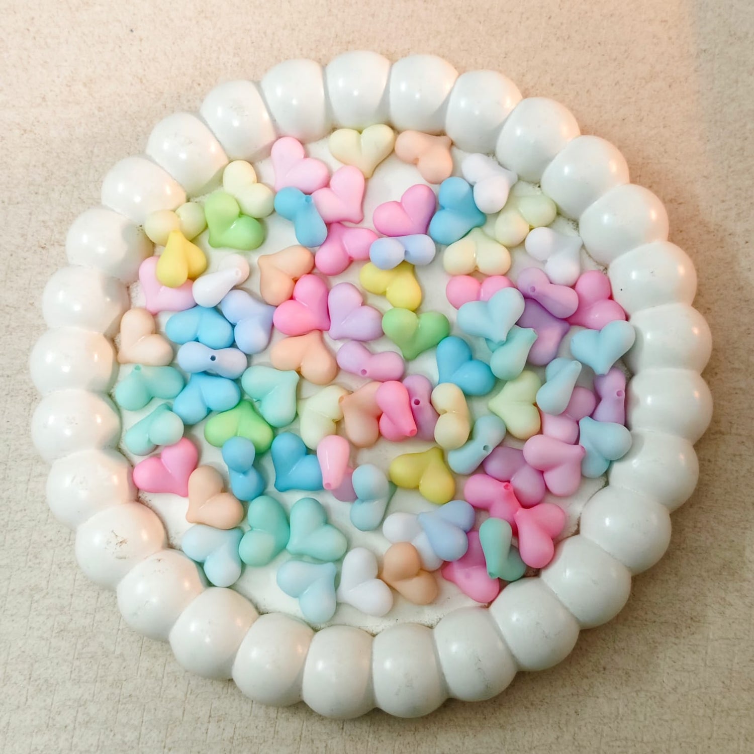 Pastel acrylic matte finish heart beads in soft colors for jewellery making and DIY craft projects