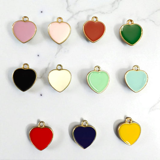 Shiny heart-shaped charms with a glossy finish, perfect for DIY jewelry, bracelets, and craft embellishments