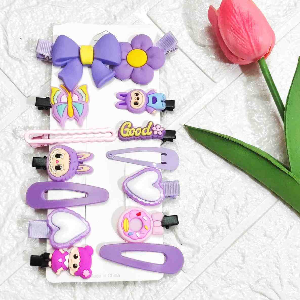 Purple theme lightweight silicon designer hair clips for kids with cute stylish designs
