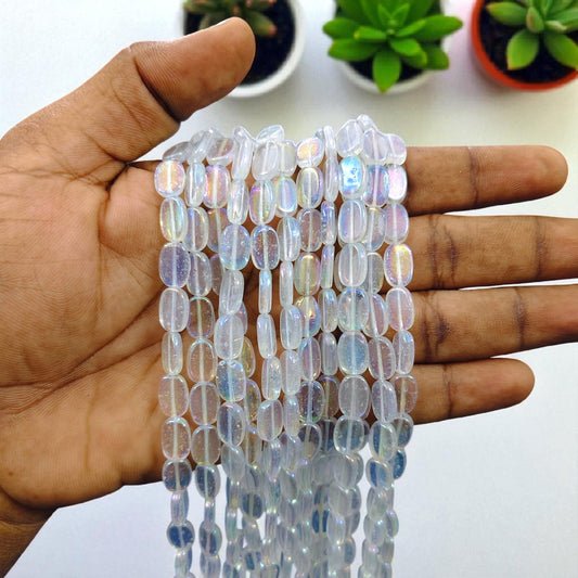 Rainbow shade tablet beads with a smooth flat design, ideal for colorful jewelry making and creative crafts.